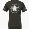 Dark heather grey t-shirt with Appeal to Heaven flag design featuring a bold White Pine Tree over a distressed American flag background. Historic patriotic graphic with strong revolutionary symbolism.