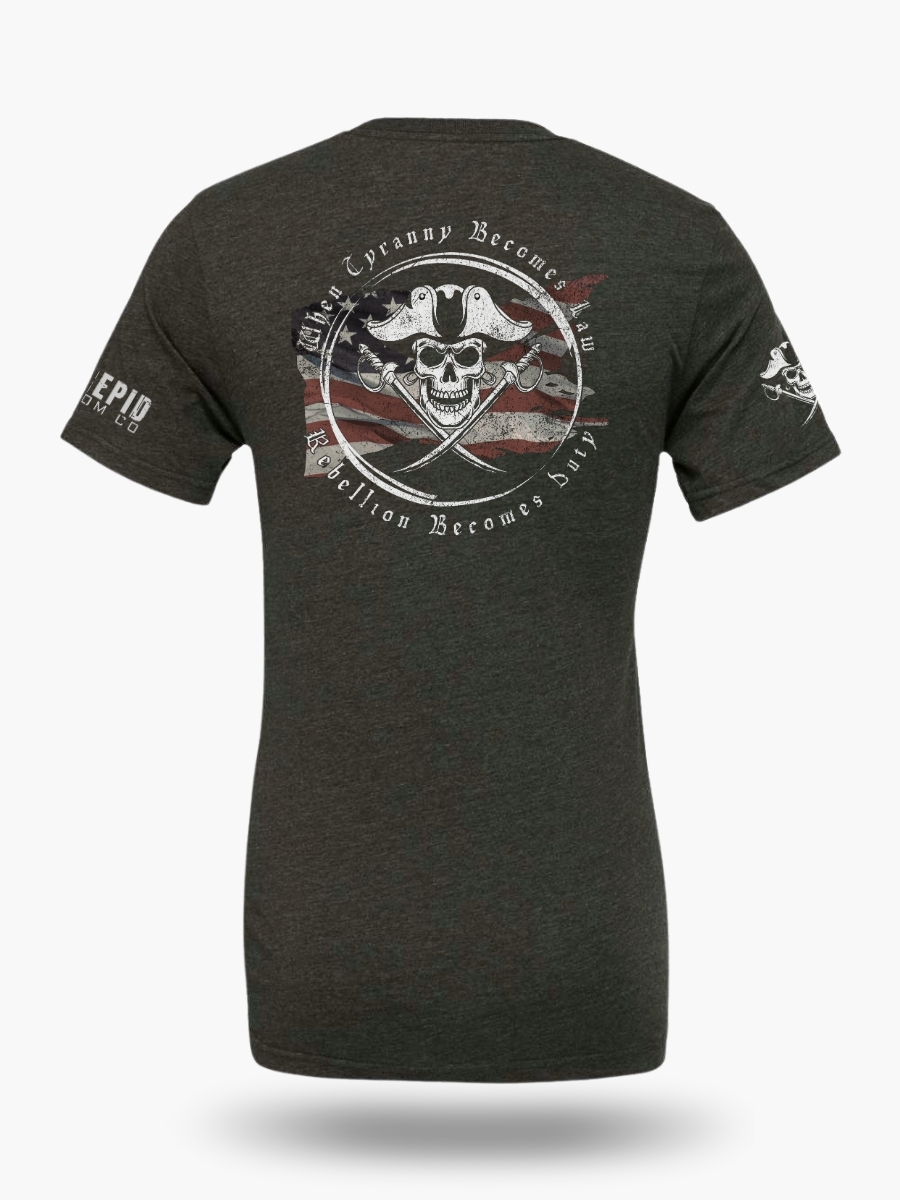 Rebellious pirate-style, dark heather grey T-shirt with distressed American flag, skull and crossed swords, and the quote When Tyranny Becomes Law Rebellion Becomes Duty.