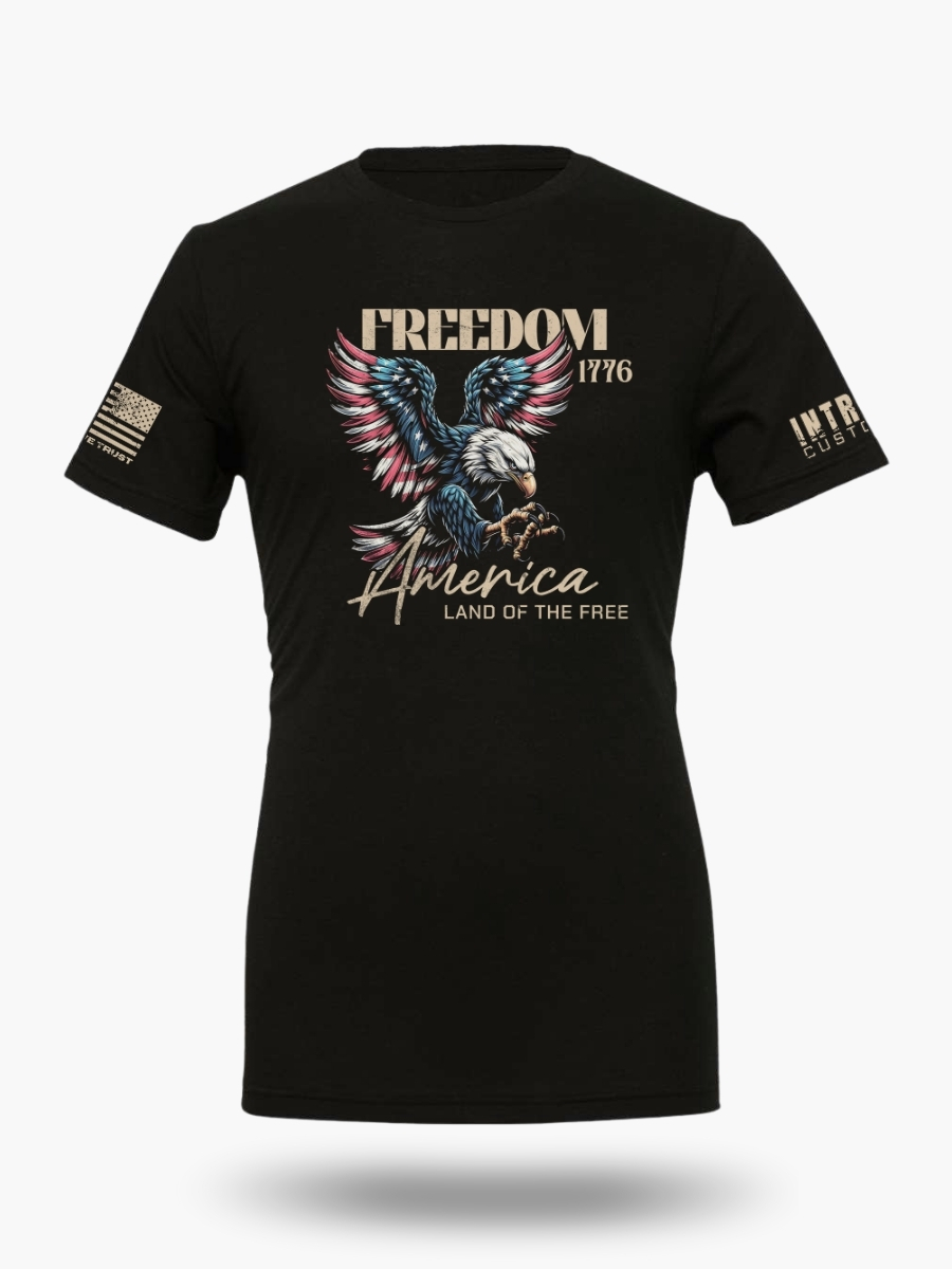 Black t-shirt displaying an eagle and "America Land of the Free Home of the Brave" and "Freedom Since 1776" text