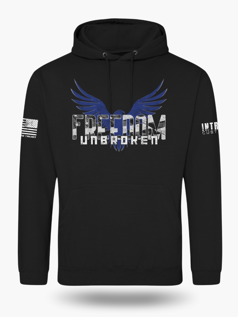 Black hoodie featuring a bold eagle with outstretched wings and the text "FREEDOM UNBROKEN" in a distressed font, with an American flag patch on the sleeve.