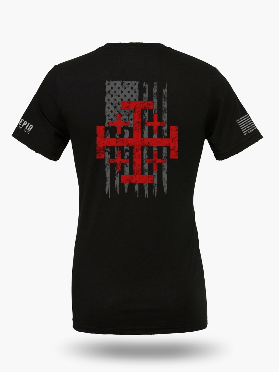 Black t-shirt featuring a Jerusalem Cross layered over a stylized American flag. Christian patriotic front design symbolizing faith and freedom.