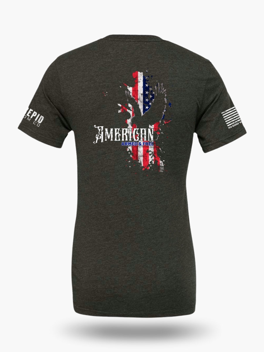 Patriotic dark heather grey t-shirt with an American flag background and a knockout eagle silhouette with the text American - Armed and Free.