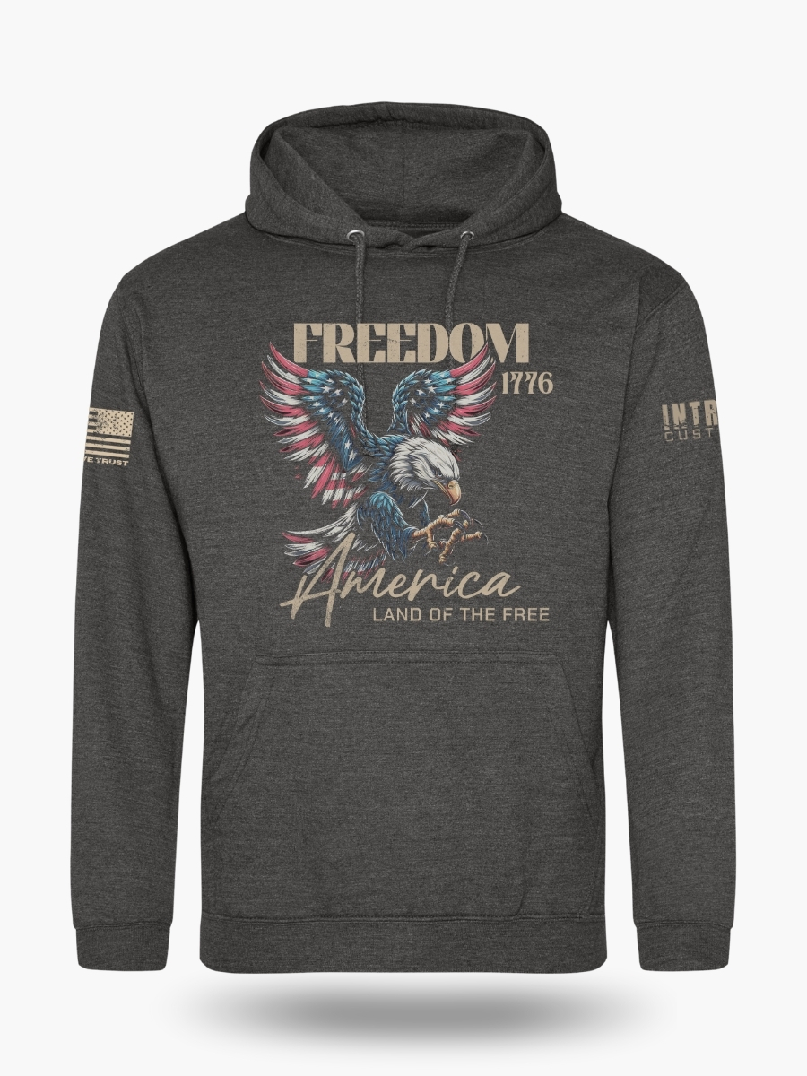 Front of charcoal grey hoodie displaying a bold American flag bald eagle graphic with the wording &acirc;Freedom 1776&acirc; and &acirc;America &acirc; Land of the Free.&acirc; Premium patriotic hoodie.