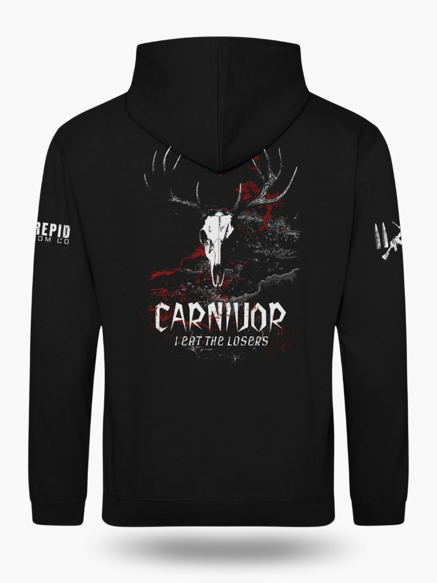 Black hoodie featuring a fierce deer skull graphic with the words &acirc;Carnivore &acirc; I Eat the Losers.&acirc; Warm, rugged hunting hoodie for outdoor enthusiasts.