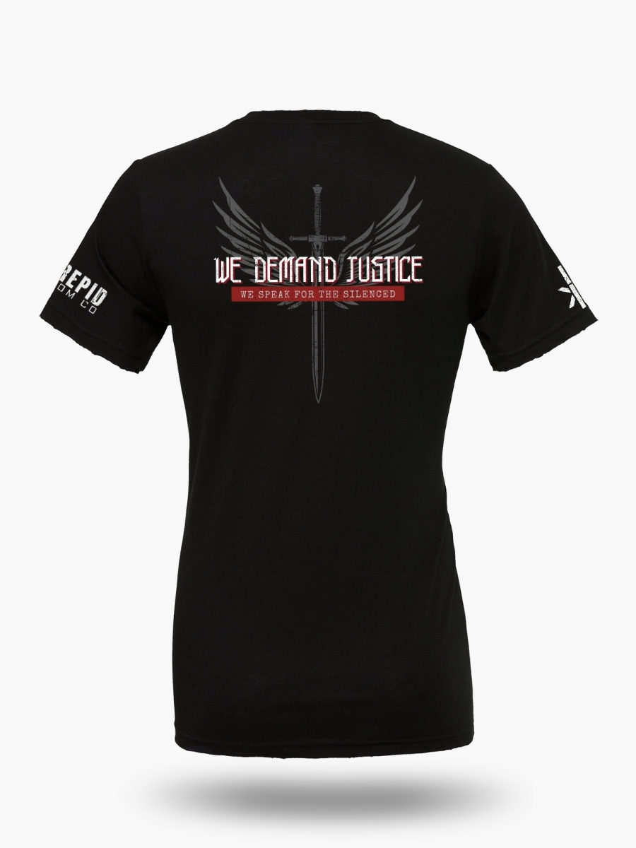Black t-shirt displaying a sword with wings and the phrases &acirc;We Demand Justice&acirc; and &acirc;We Speak for the Silenced.&acirc; Bold Christian design inspired by biblical justice.