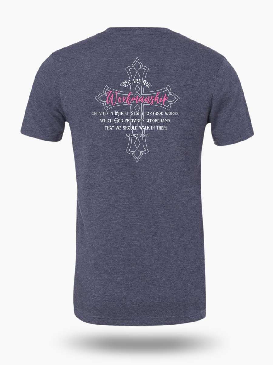 Elegant women&acirc;s Christian t-shirt features a beautiful ornate cross with 'We Are His Workmanship' in pink script and the full Ephesians 2:10 verse. Front design reads 'God Made With Purpose'. A graceful daily reminder of your identity in Christ. Color Heather Navy.